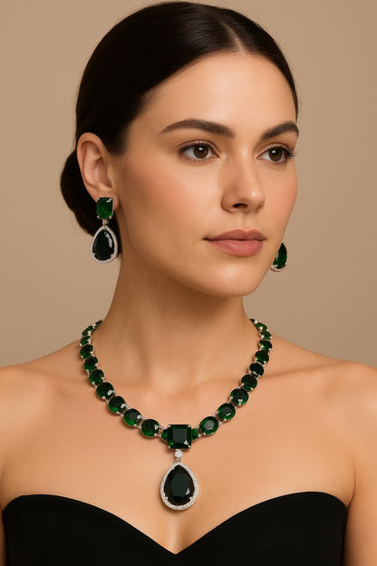 Emerald Green Necklace Set

An enchanting emerald green stone necklace set with teardrop and cushion-cut details. Its rich color and shimmering finish make it the perfect accessory for weddings, receptions, and festive celebrations.


